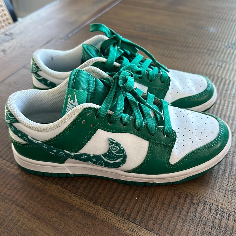 Nike dunks with paisley swoosh